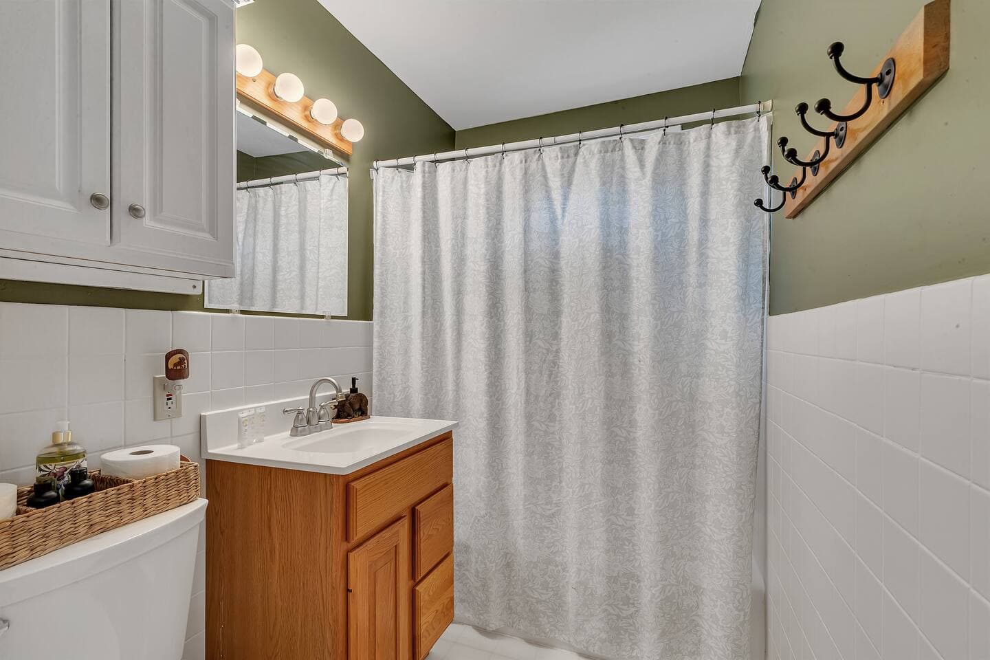 Full bathroom with shower and tub 