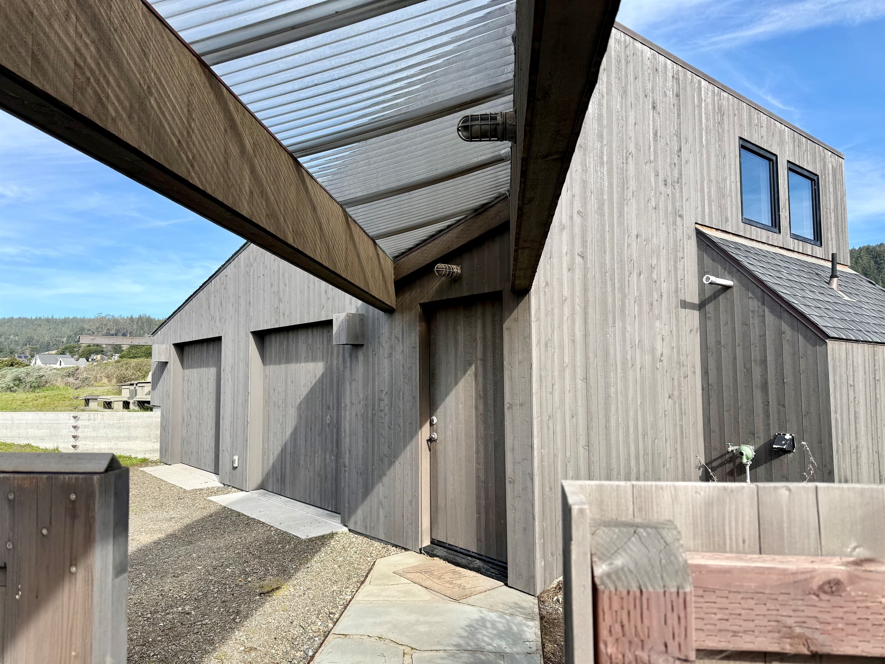 Guests have 1 parking space on the right side of the garage. In the garage are outdoor games, lounge chairs, and a ping-pong table. A washer and dryer are also available. The garage opener is located inside the house.