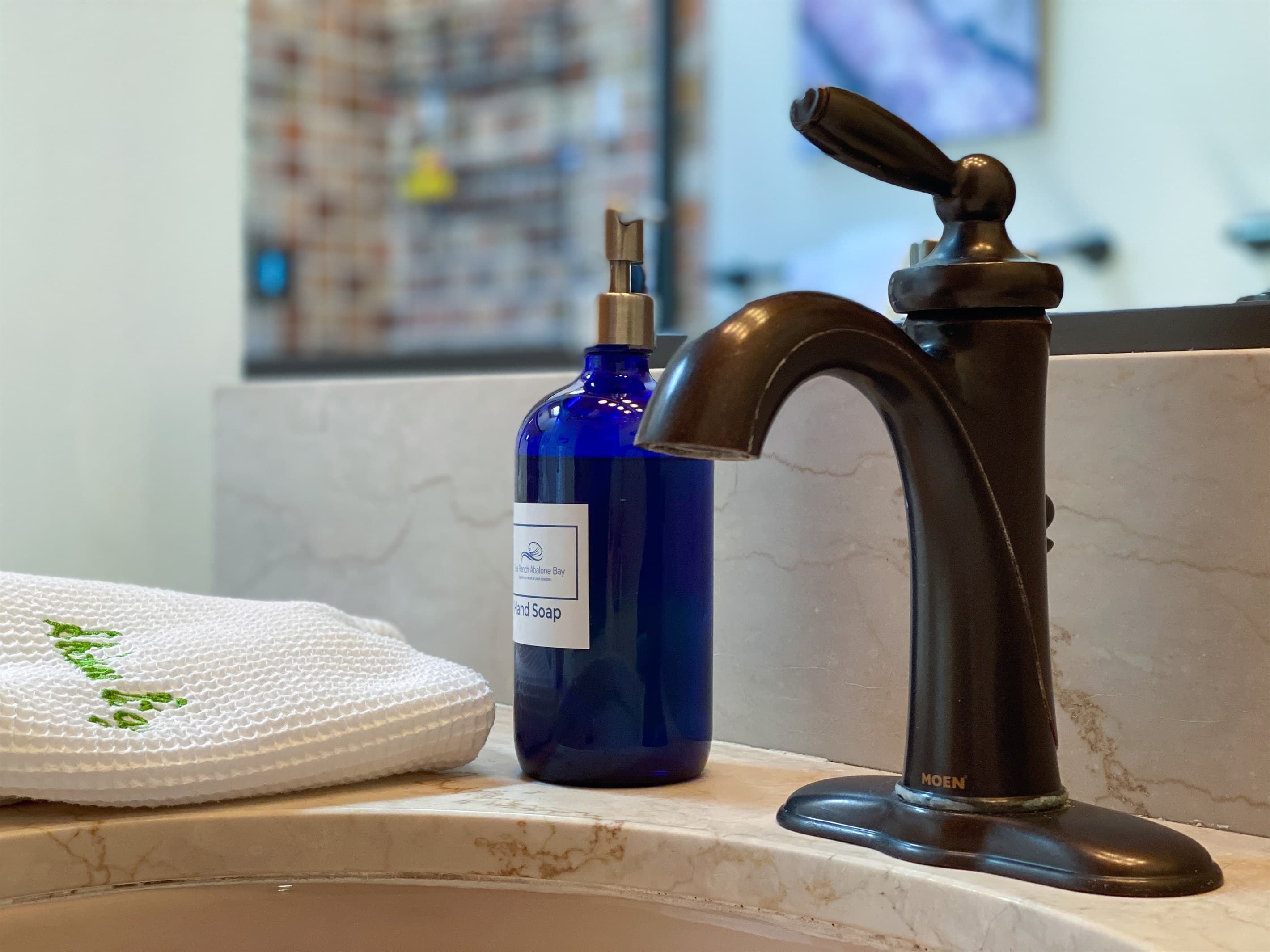 Paya Hand Soap and bathrobe.