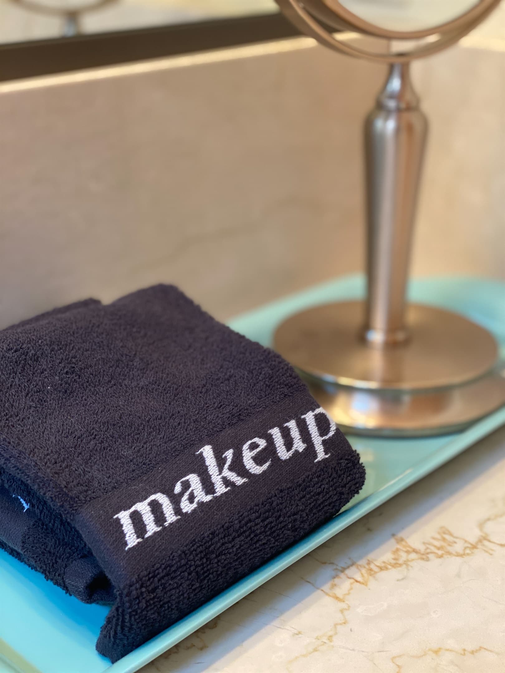 Hall bath amenities include a hair dryer, makeup remover cloth, and wipes.