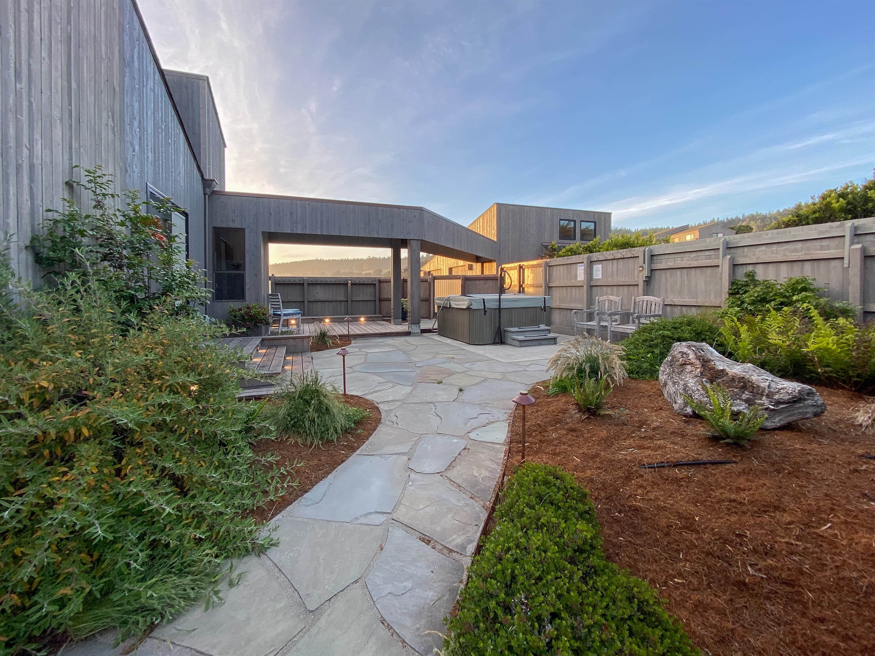 Courtyard with decking and paved pathway