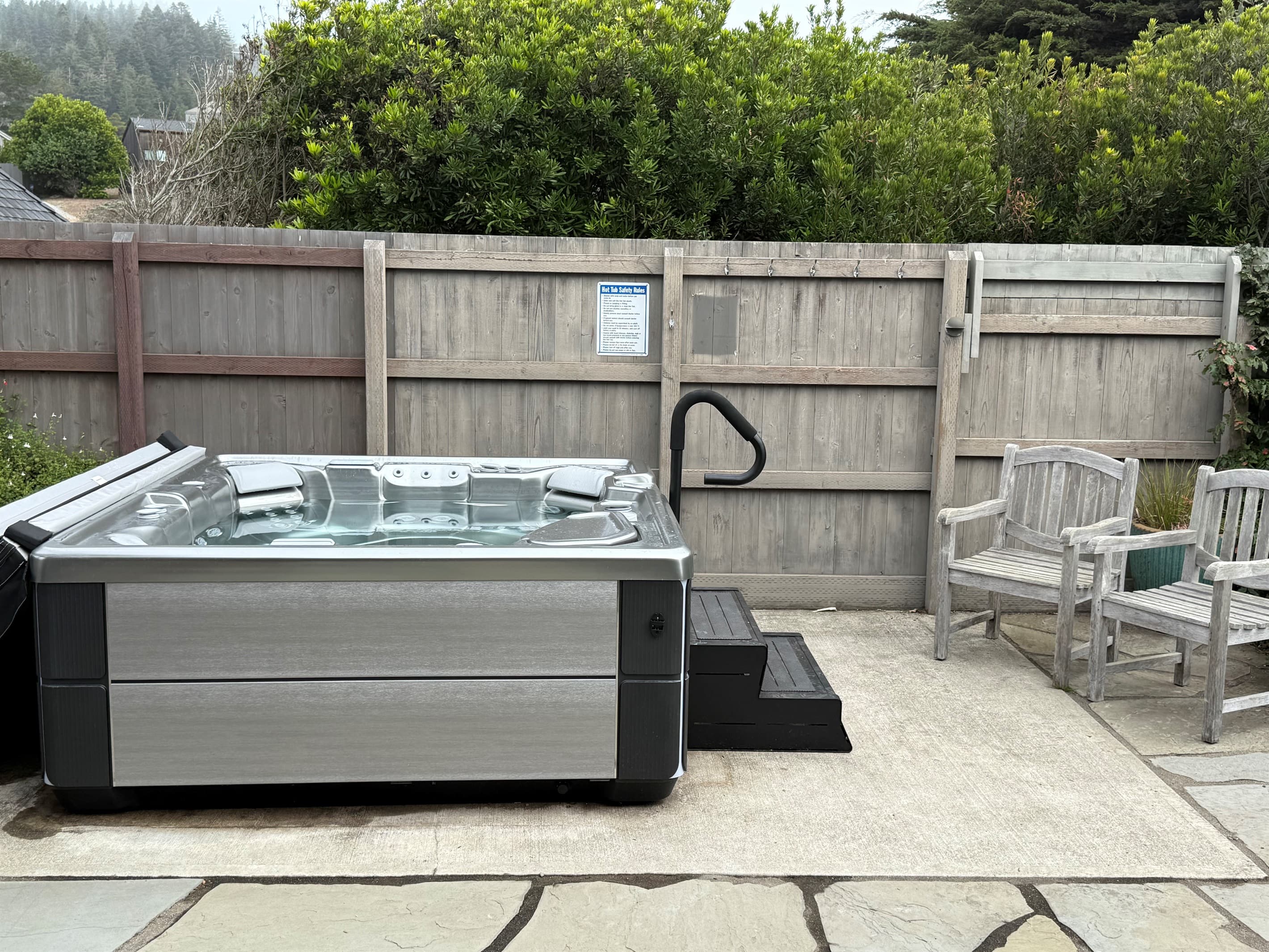 "Great hot tub in the private backyard." Private hot tub with multi jet massage and view of ocean from hot tub.