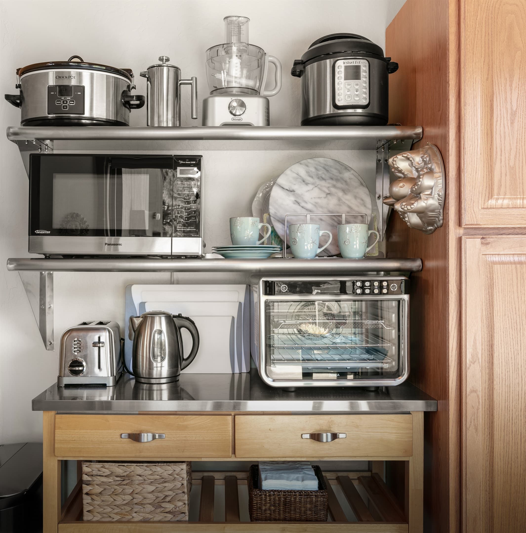 " The kitchen was perhaps the best stocked kitchen I have ever seen in a rental." Premium small appliances stored on sleek, stainless steel shelving make up the well-stocked kitchen at Sea Ranch Abalone Bay.