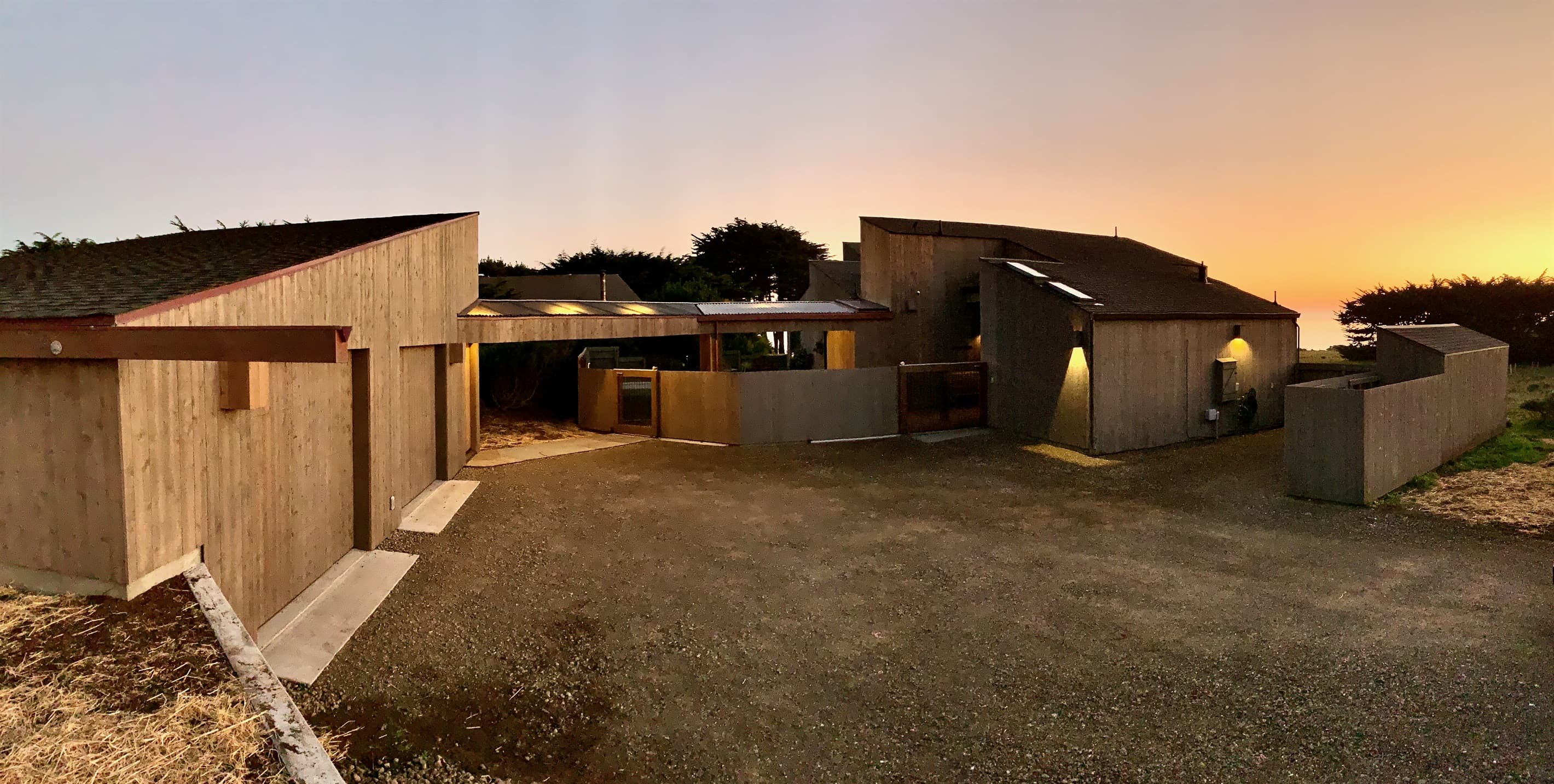Lighted walkways from Garage to house at twilight