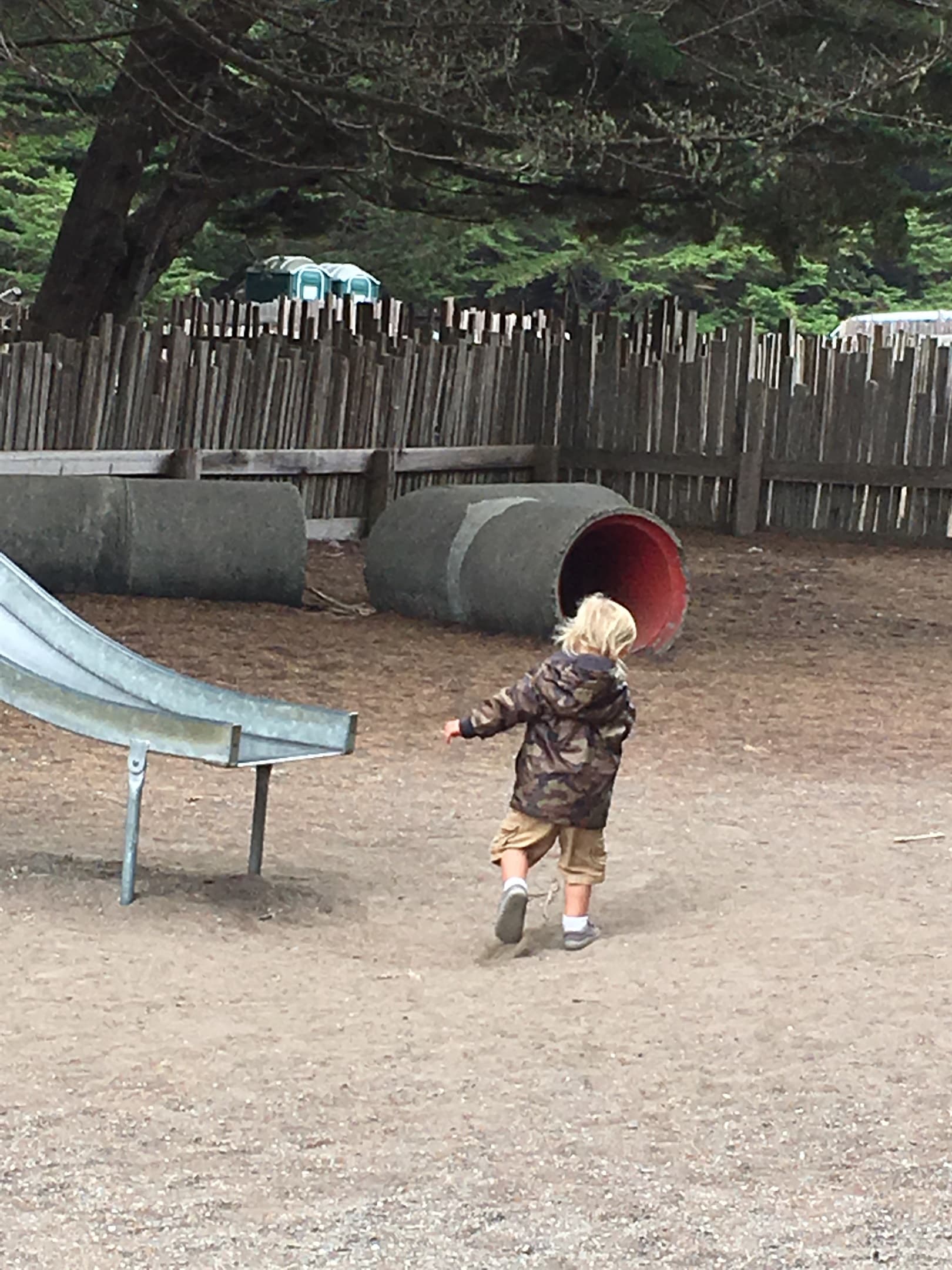 Community playground includes picnic area and Pétanque court