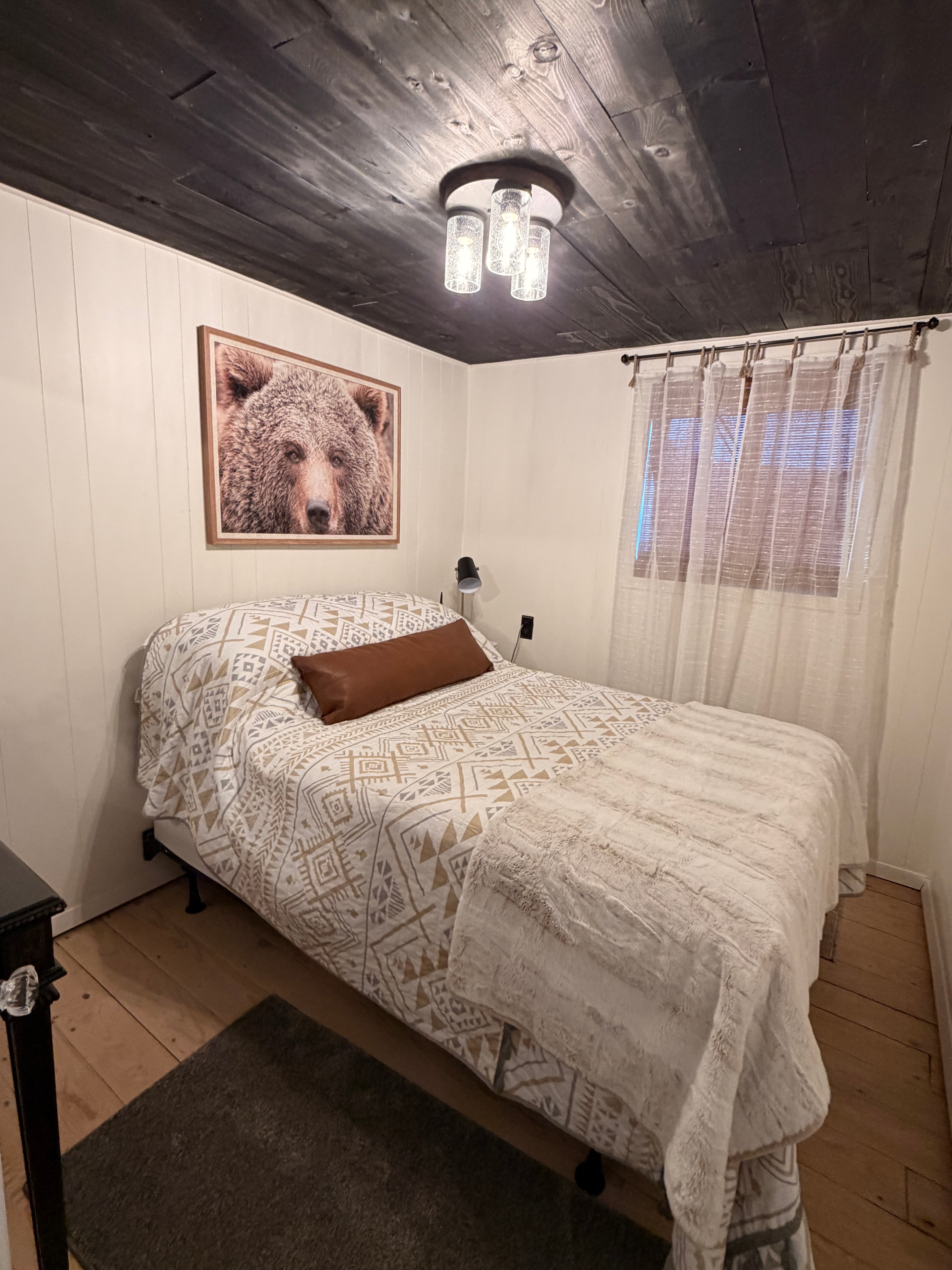 Downstairs bedroom- very tiny but cozy! 