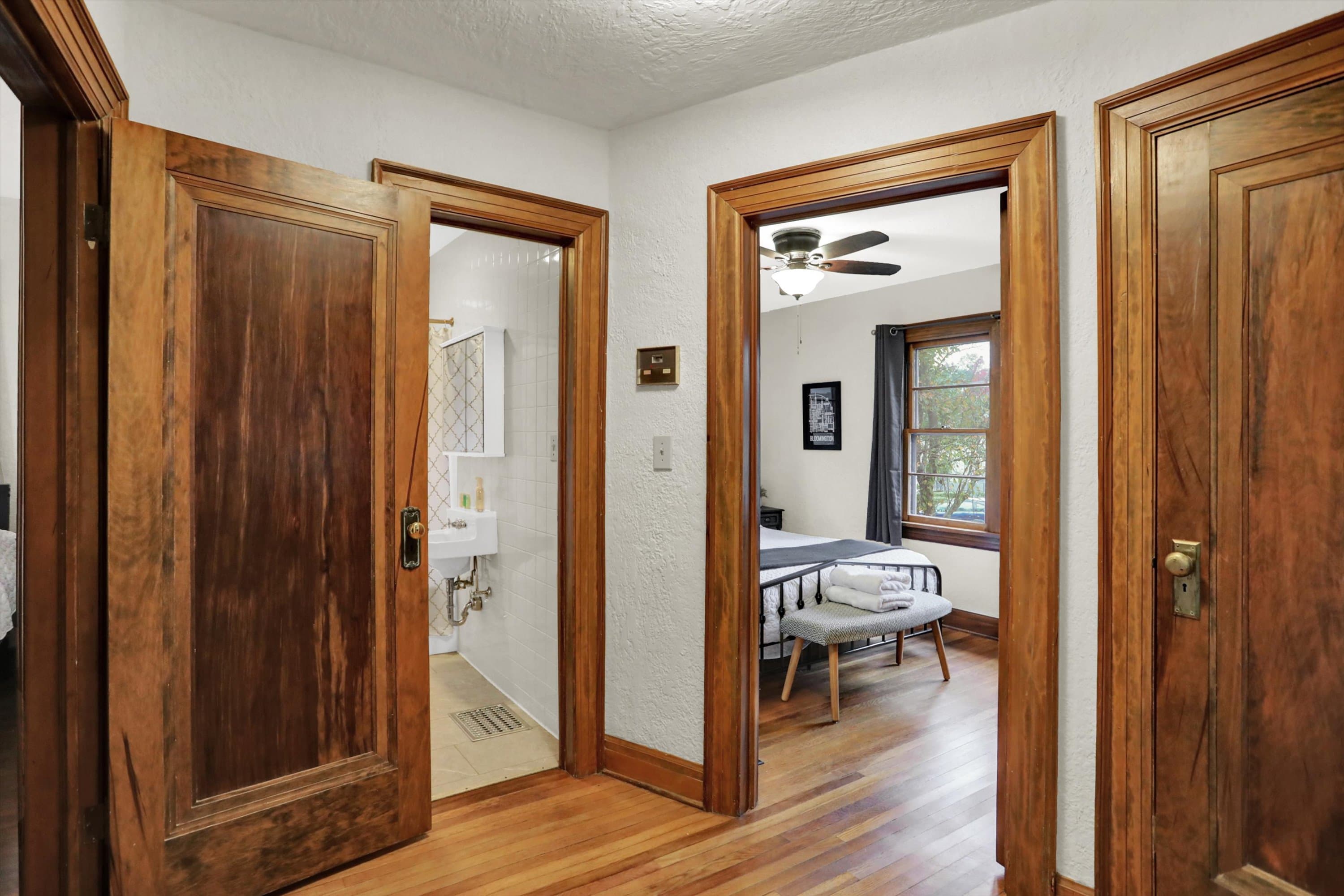 Hallway to the bedrooms with linen and utility closets
