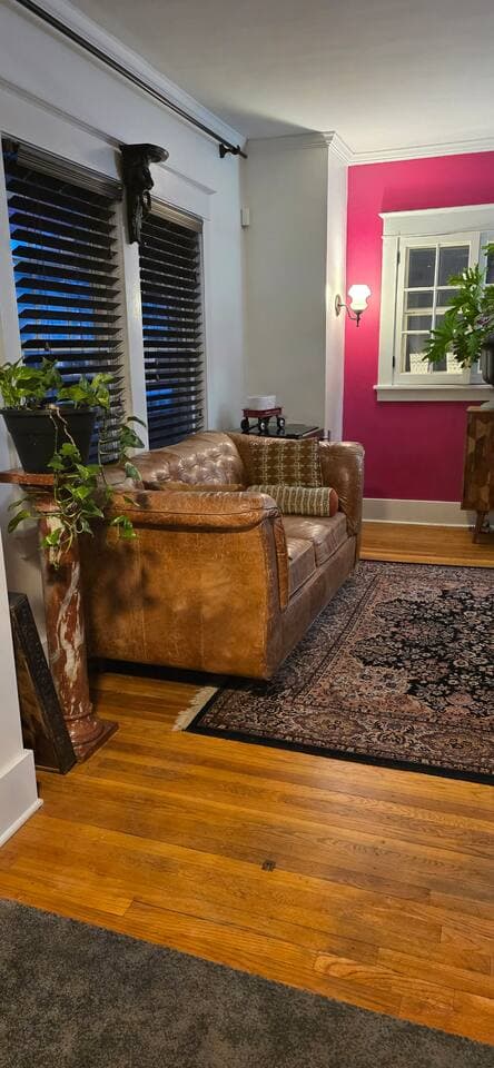 Unwind on the comfortable leather sofa for extra seating and relaxation space 