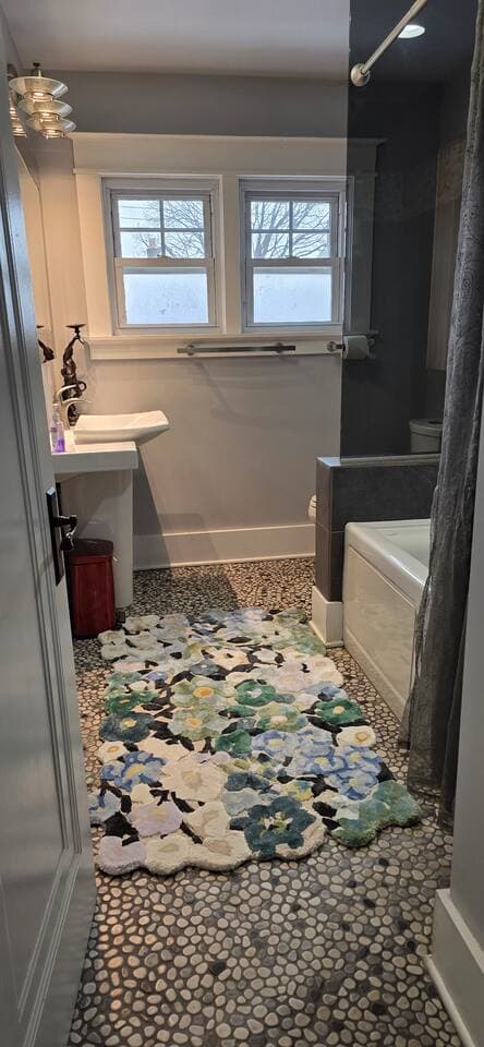 The second bathroom has been lovingly remodeled to give true spa vibes. 