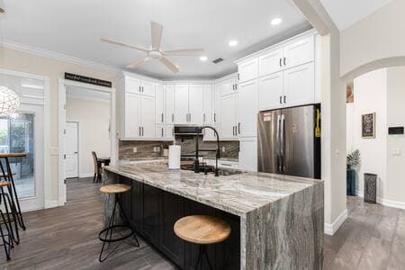 There's plenty of places to sit and get cozy in this chef's kitchen.