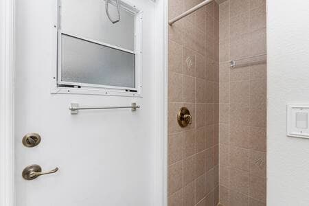 Relax in this large shower.