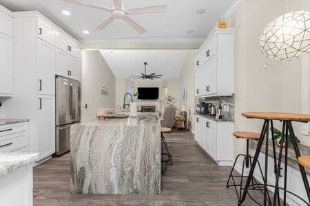 Prepare your beautiful meals in this custom luxurious kitchen with so much space