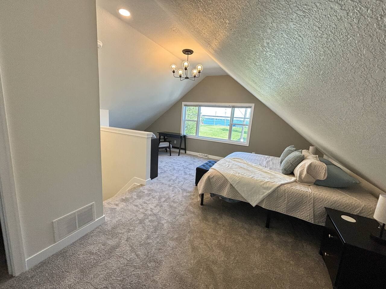 Relax in the beautiful upstairs bedroom with an ensuite bathroom