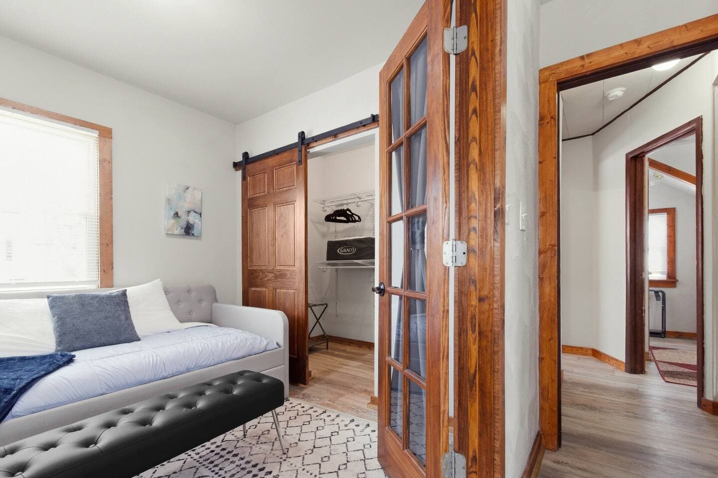 The 3rd bedroom features an en-suite sitting area with a daybed.  There is ample closet space and room to rest and relax. 