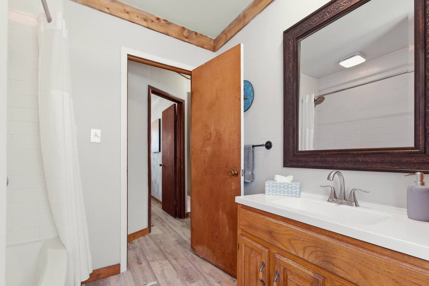 Prepare for your Erie adventure in the spacious upstairs bathroom. 