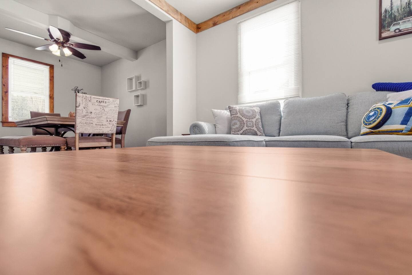 The dining area is the perfect place to unwind and it flows seamlessly into the living area