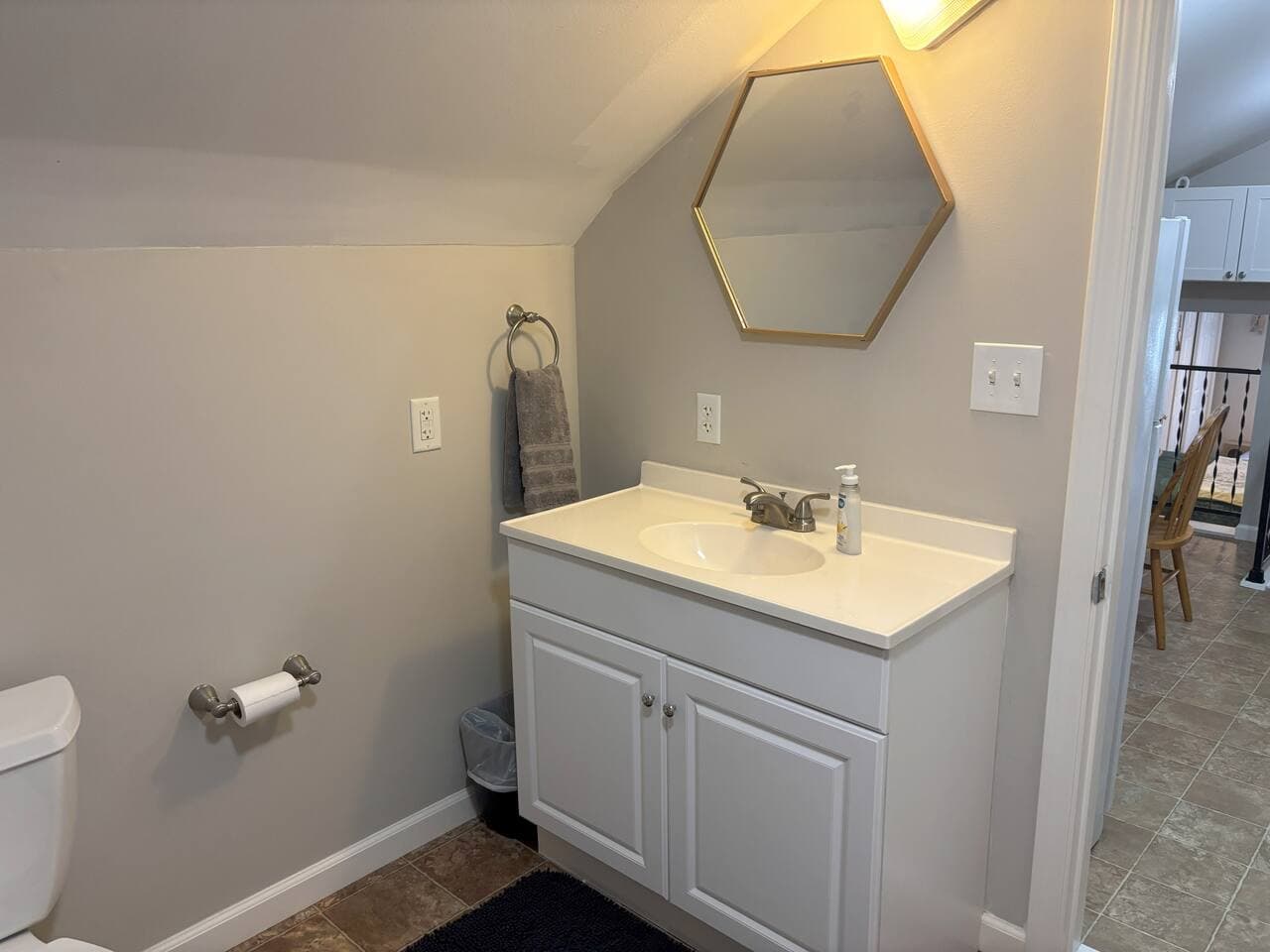 Thoughtfully updated with modern finishes, the bathroom offers plenty of room to get ready for the day or unwind in comfort after exploring Lake Erie.
Fresh towels and bathroom essentials are provided for your convenience.

