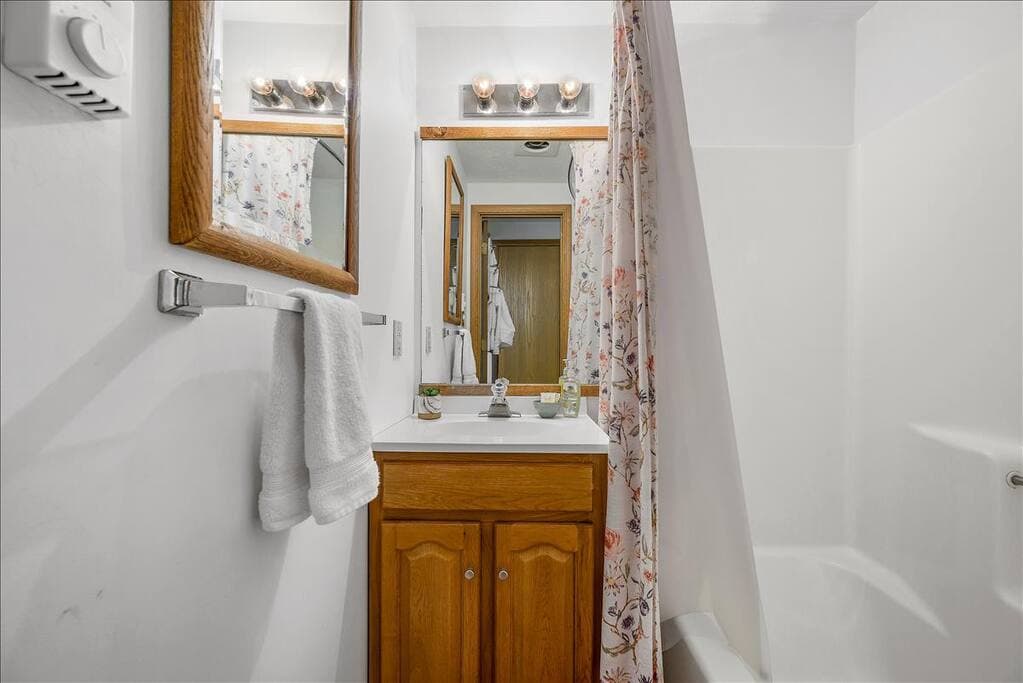 The bathroom is split into two rooms - here's the tub / shower