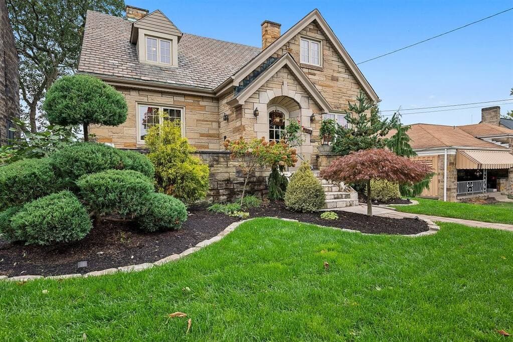 Front yard and help yourself to the garden on the front porch
