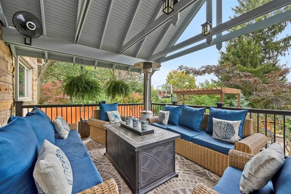 Get comfortable around the fire table on the back porch48a592ef ec10 4460 aa4d 79f1a7d946e0