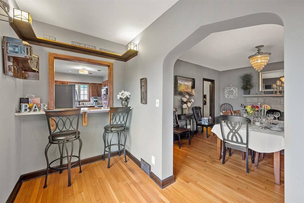 Bar/breakfast nook. Original details throughout including hardwood floors and lighting