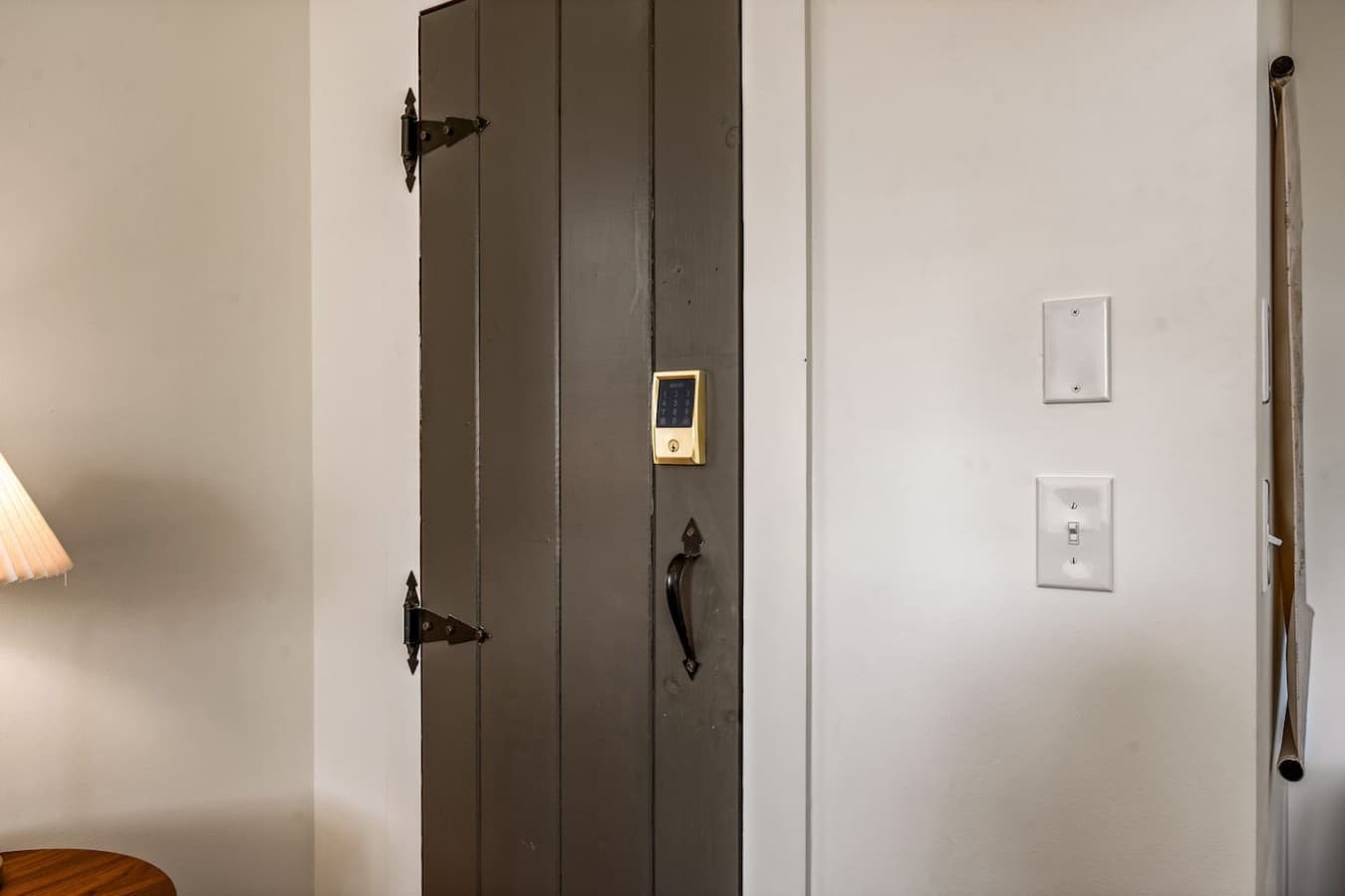 Private door of the entryway that leads to the cozy two-person sauna.
