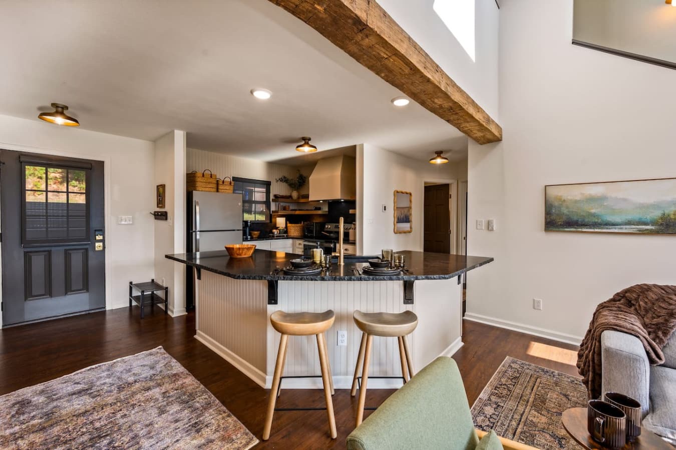 The spacious layout connects seamlessly to the living area, creating a welcoming hub for gathering and conversation.