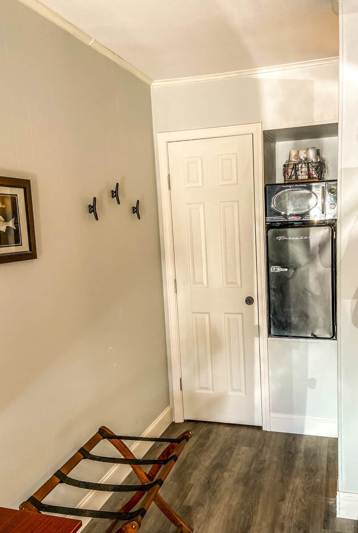 False closet but hooks for hanging clothes