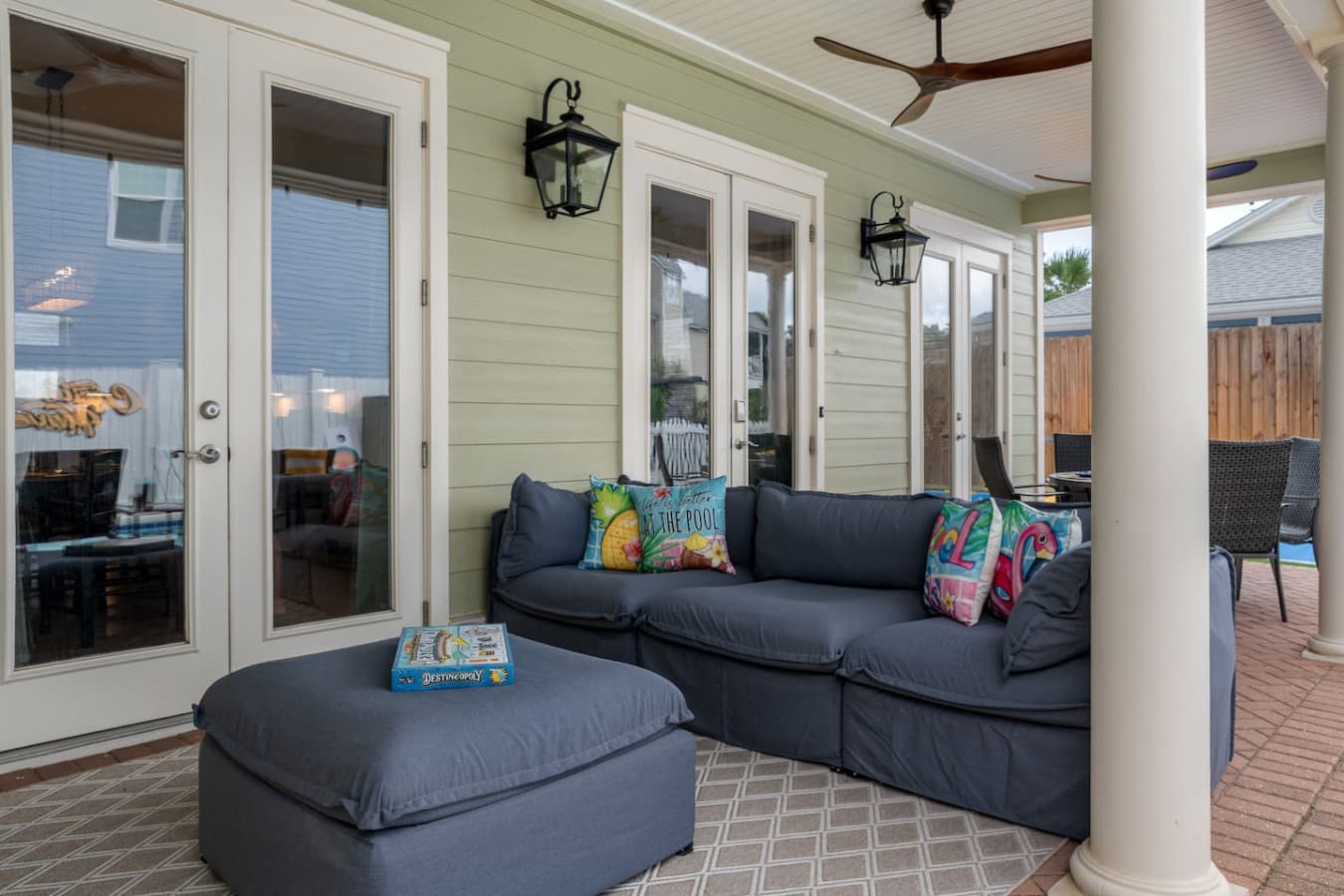 The perfect patio couch to relax on while watching the 75" outdoor TV