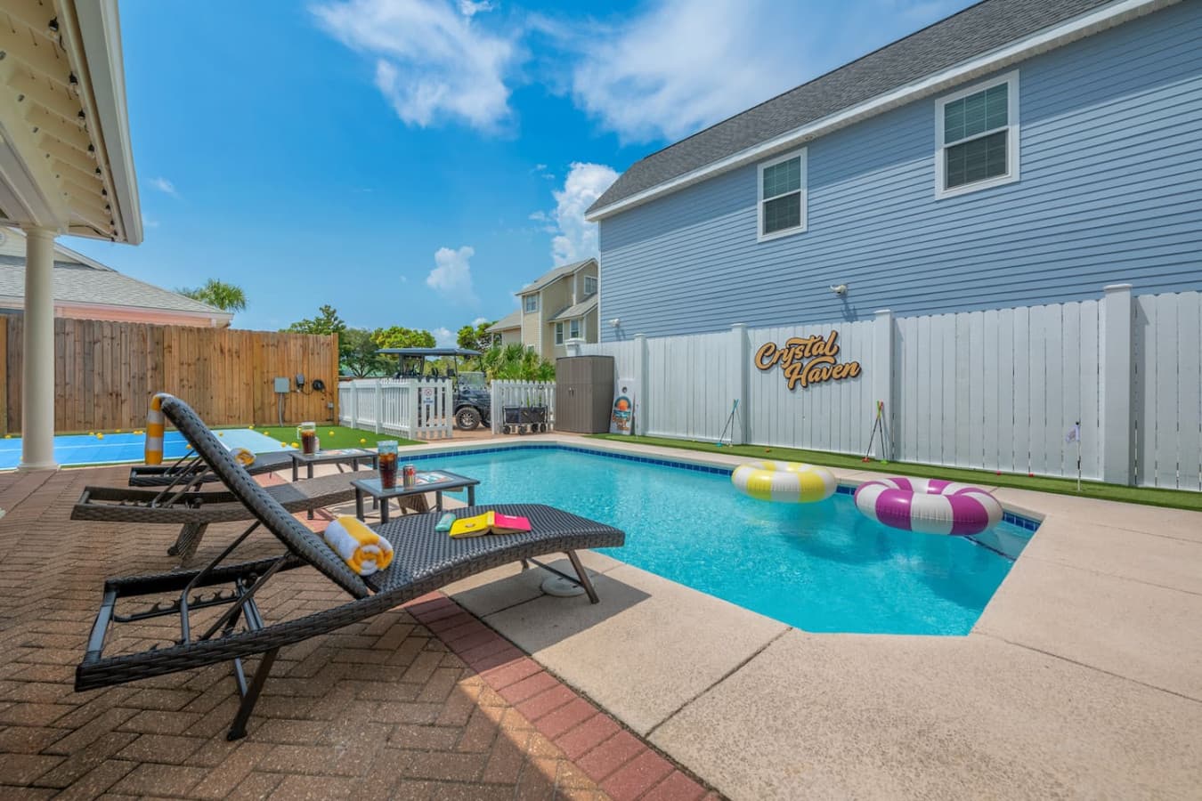 Custom putting green, corn hole, pool, pickleball--it's all part of the Crystal Haven way