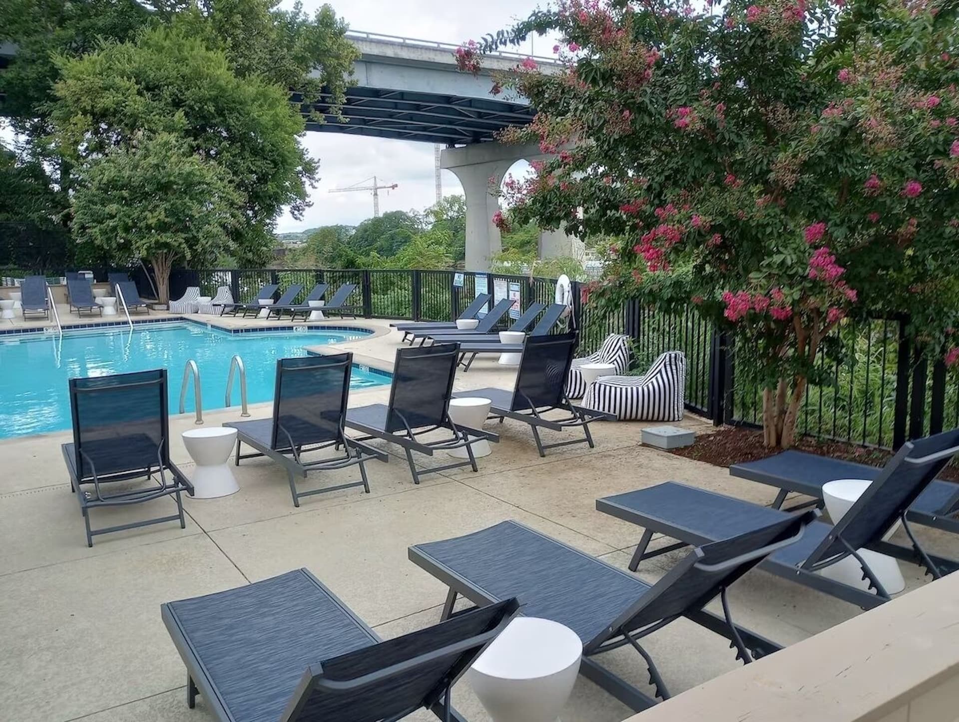 Relax as you lounge by the community pool