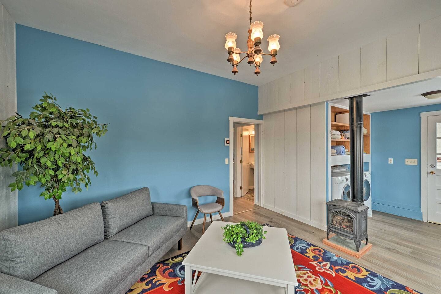 Warm your toes by the gas stove as you lounge in the living room