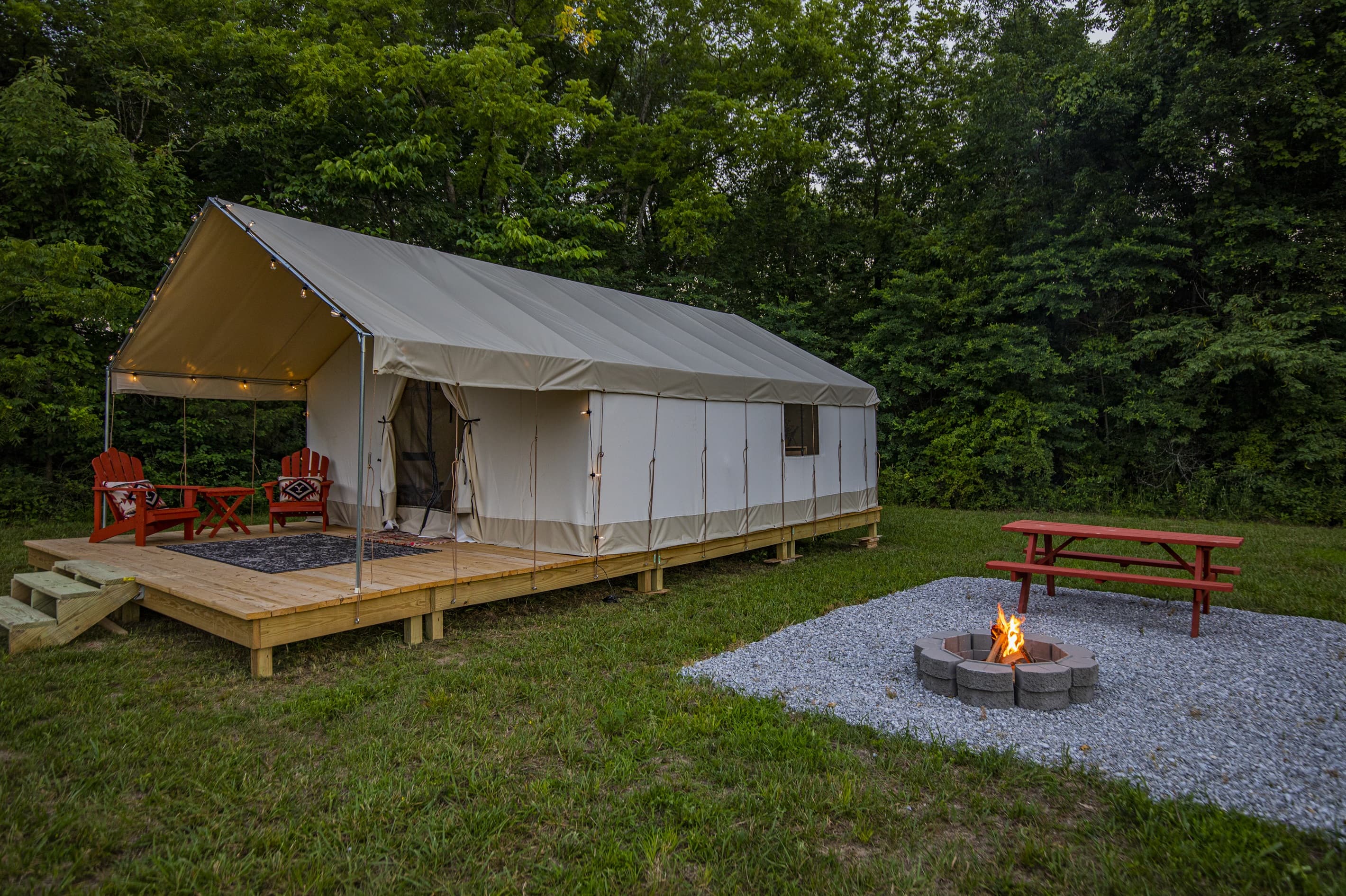 Wooden stove to keep you warm inside, firepit to keep you cozy outside.