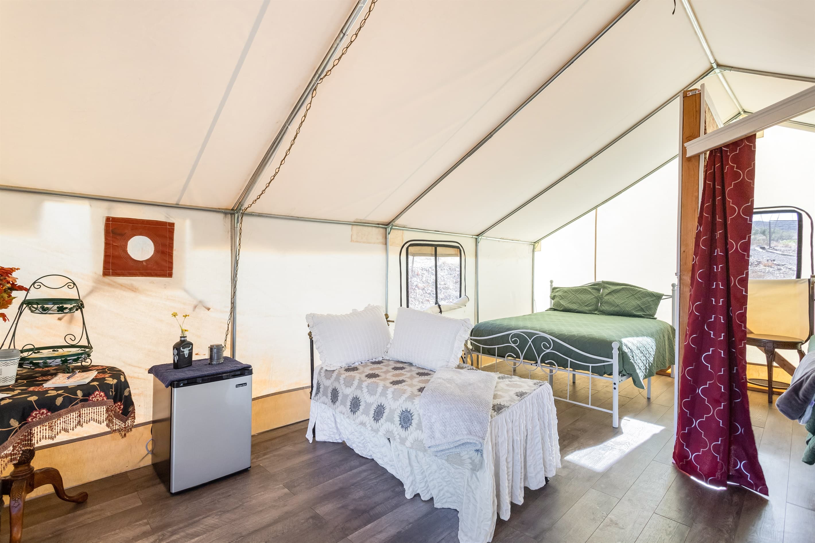 Featuring a Queen Bed, antique trundle bed, AC and heating, and mini-fridge