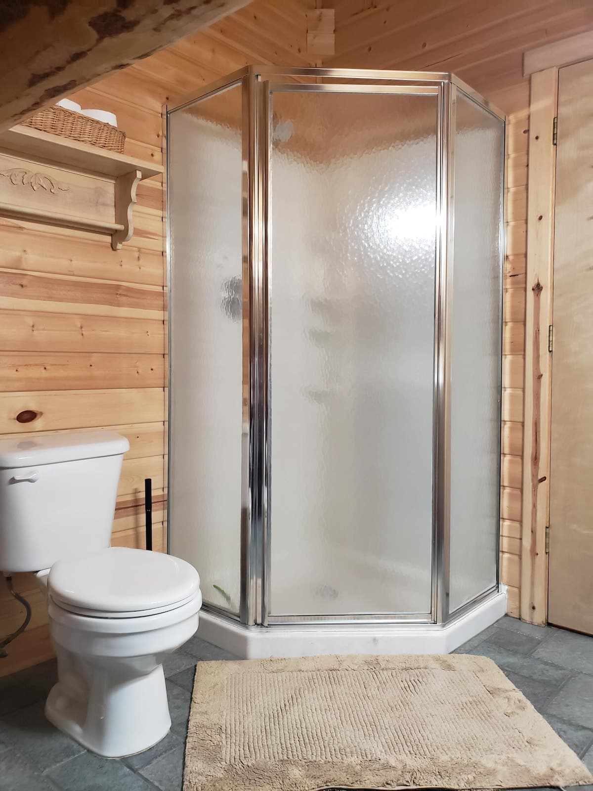 Large corner shower in upstairs bathroom.