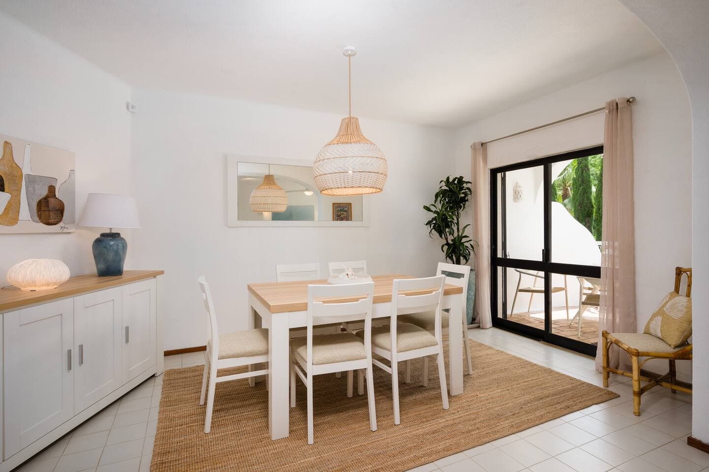 Dining table for up to 8 people - perfect space to gather for meals or work remotely with a garden view
