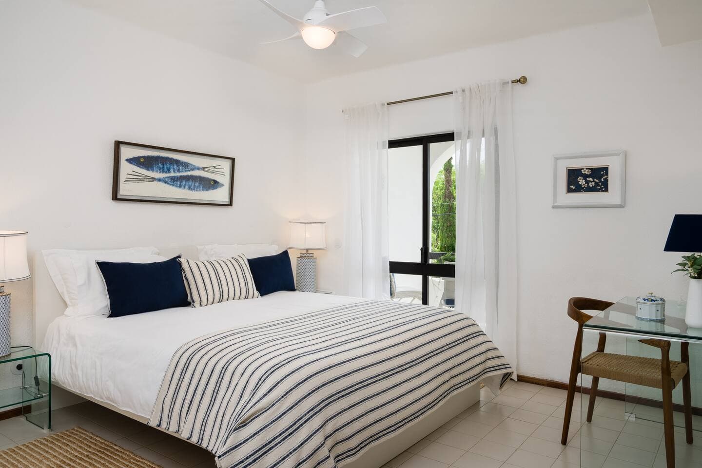 Spacious main bedroom with working desk,  private bathroom, private balcony and natural light.