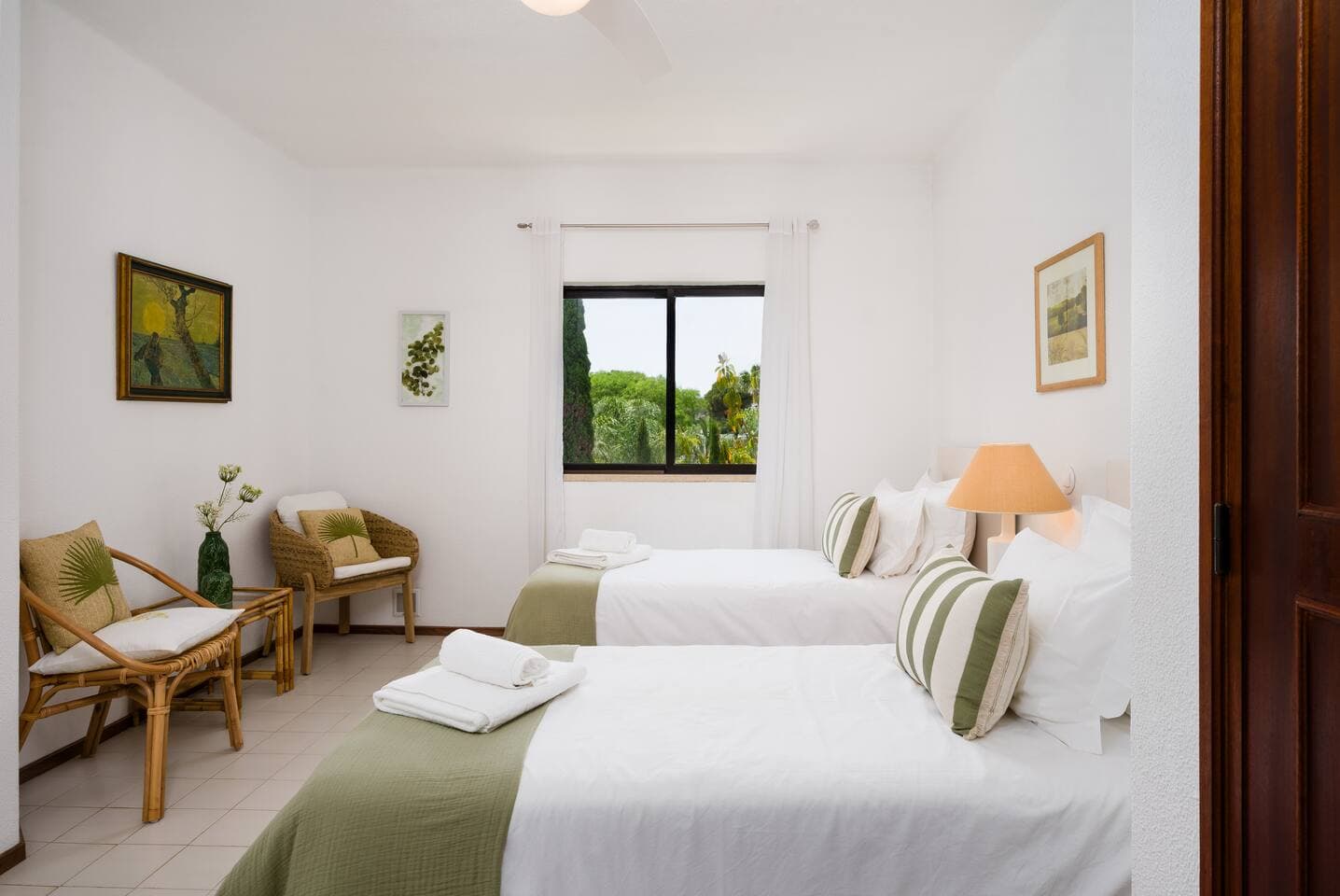 Second bedroom with flexible layout, seating and wardrobe space 