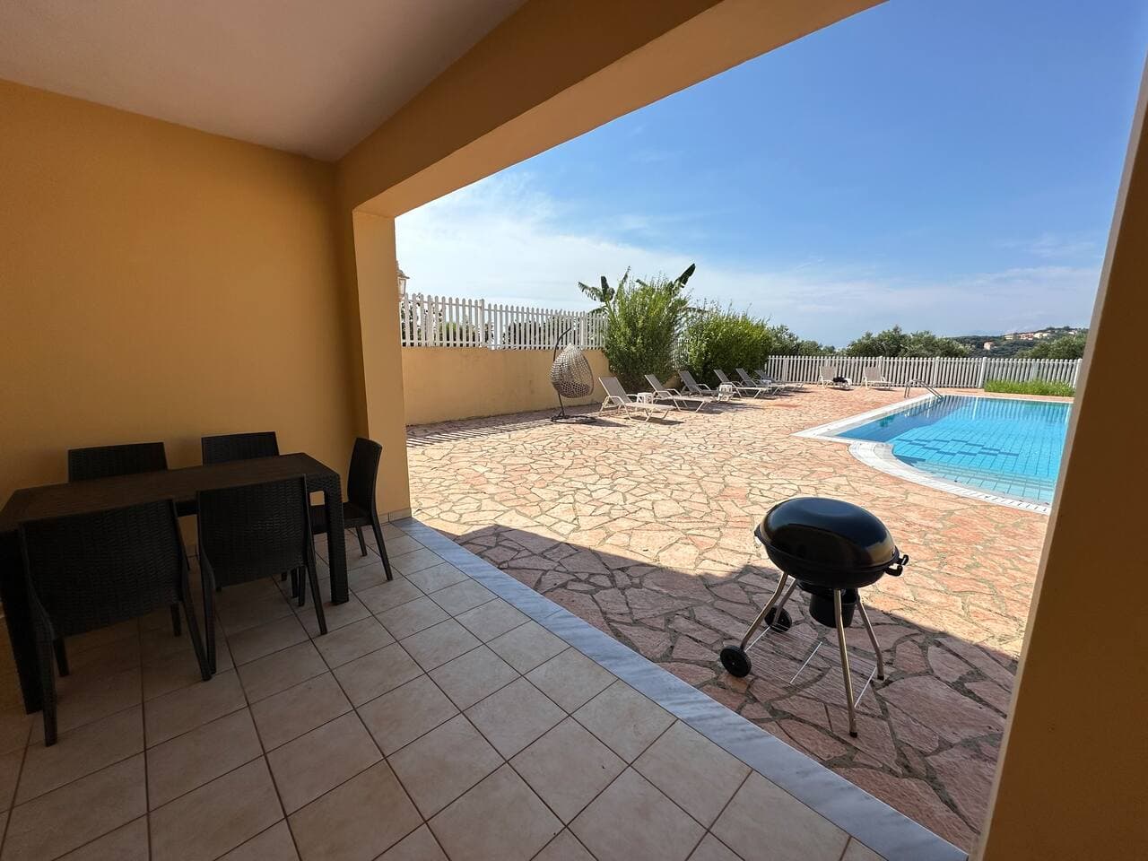 Lower level exterior dining area BBQ