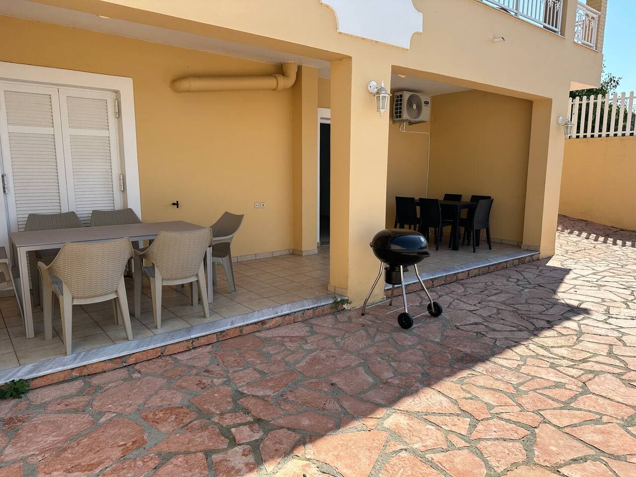 Lower level exterior dining area and BBQ