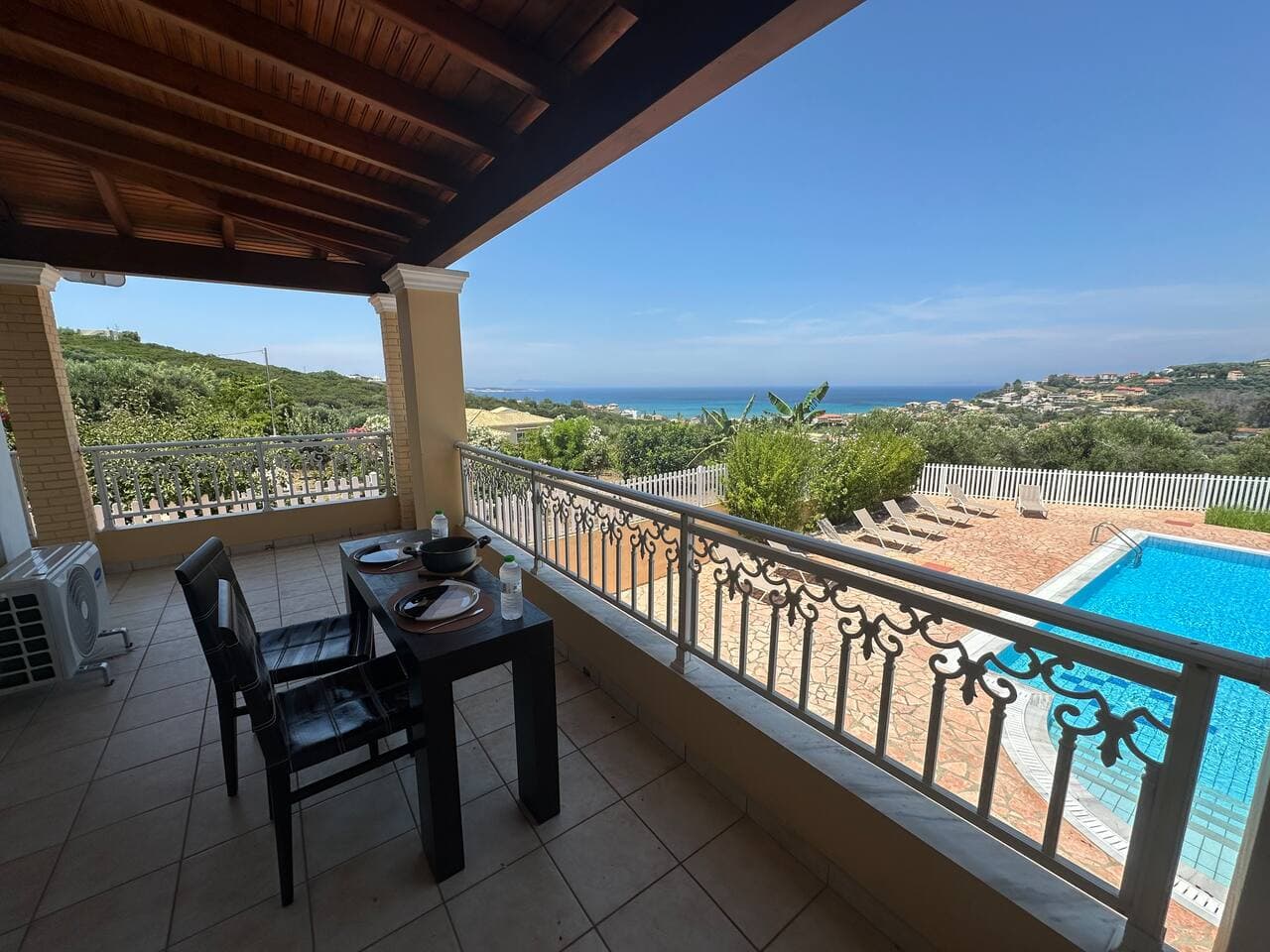 external dining area overlooking the swimming pool