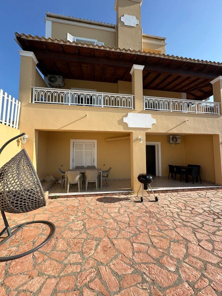 Outdoor dining room, BBQ by swimming pool