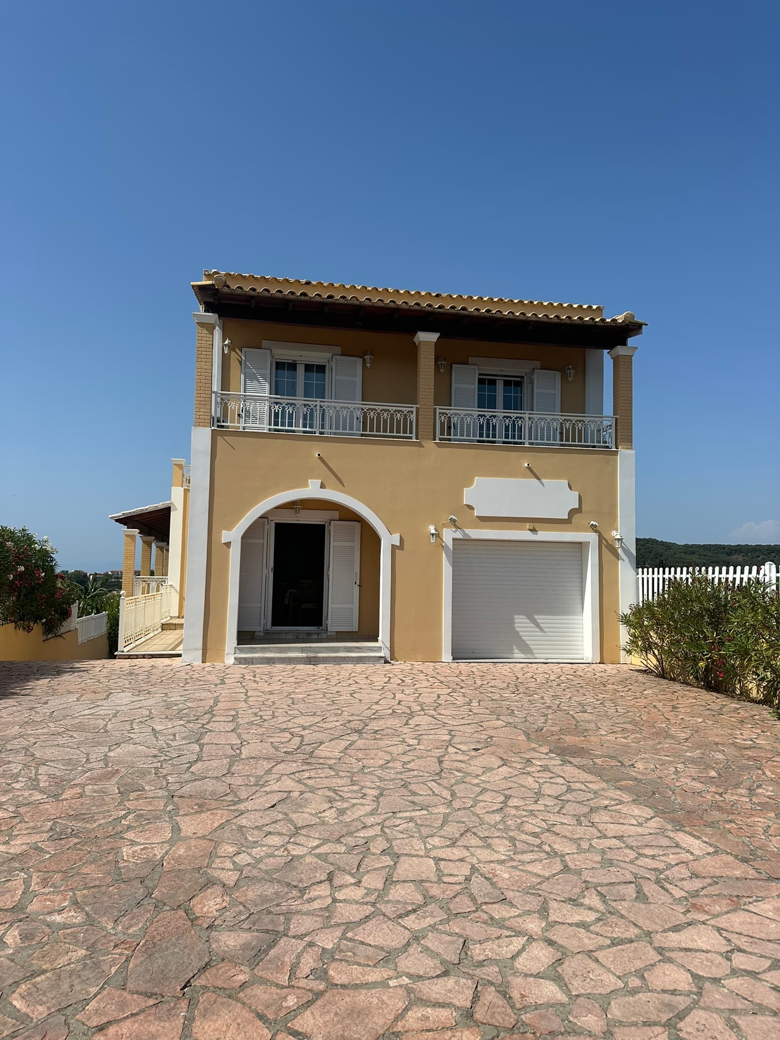 Front of the house with private parking