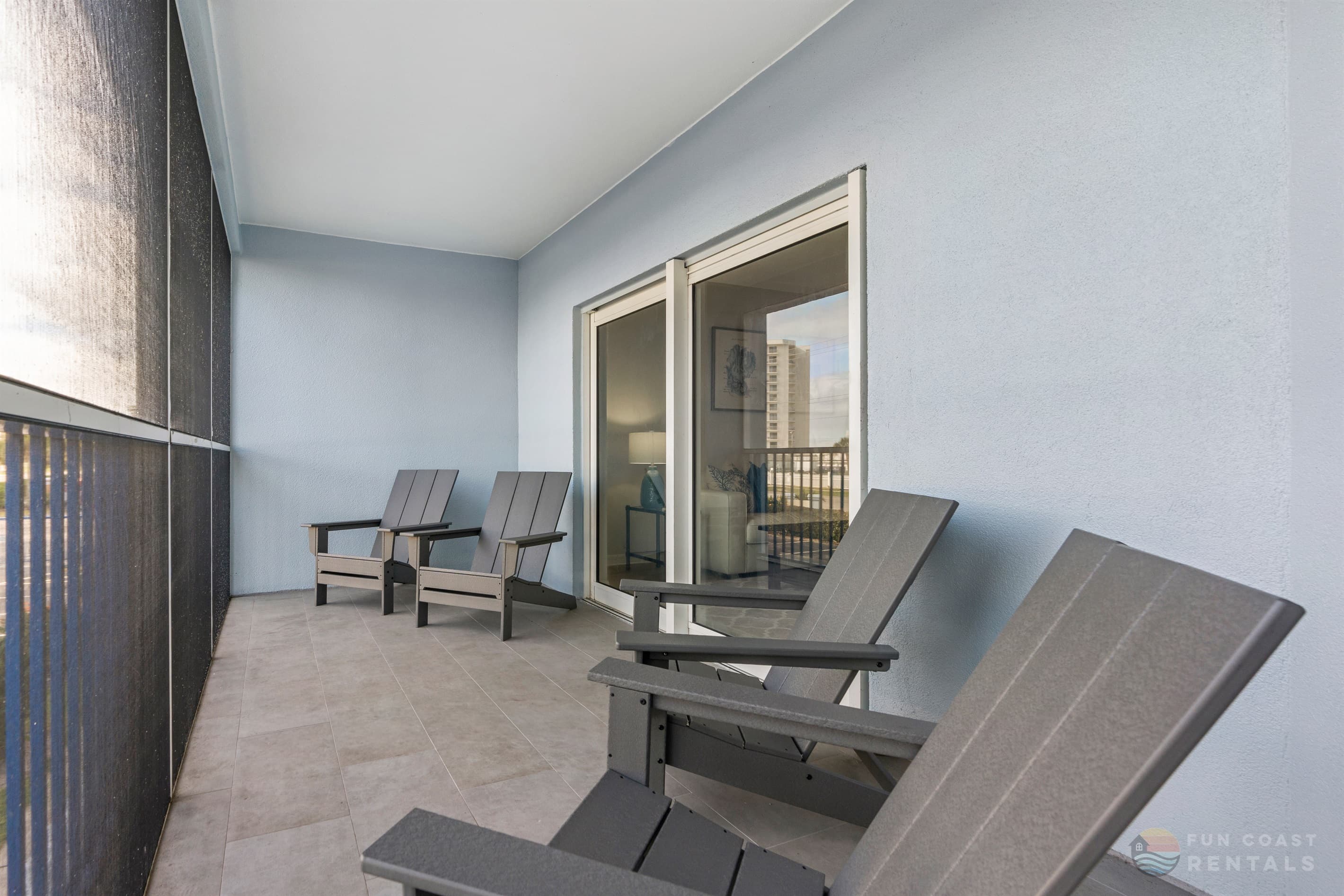 East-Facing Balcony View with Screen and Ample Seating