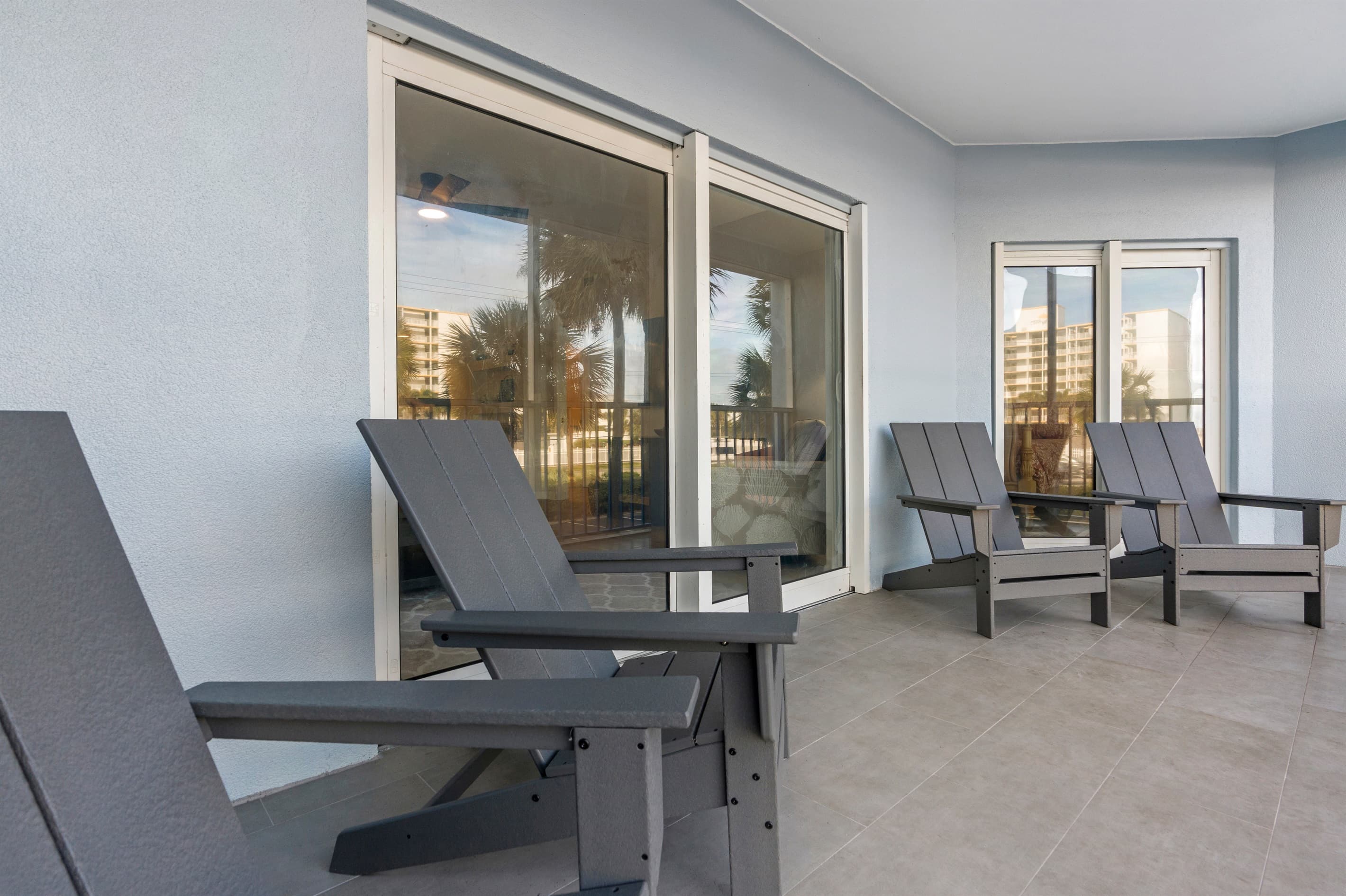 East-Facing Balcony View with Screen and Ample Seating