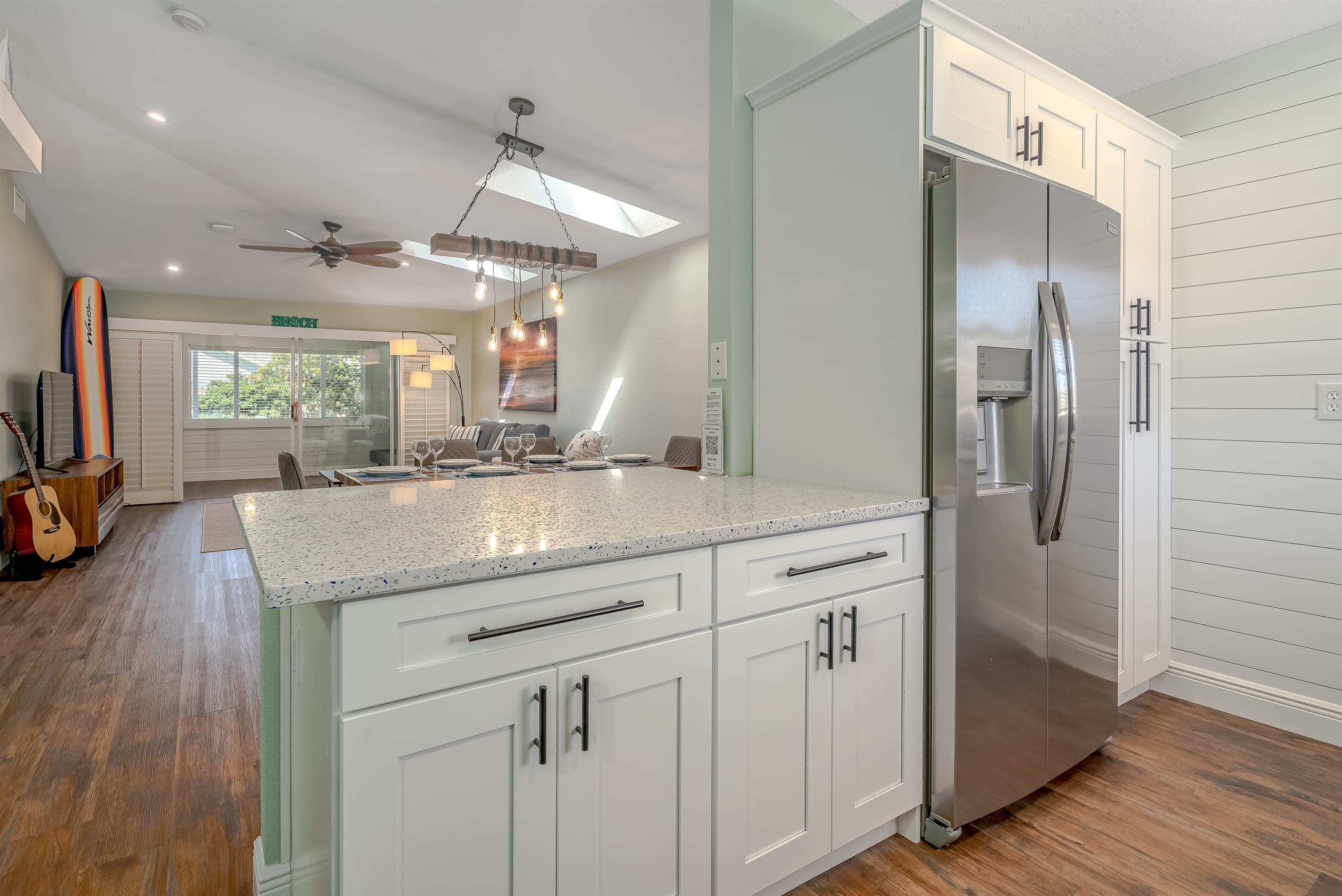 Fully Equipped Stainless Steel Kitchen w/ Bar Seating