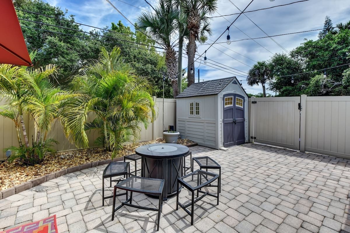 Private Fenced String-Lit Yard with Fire Pit