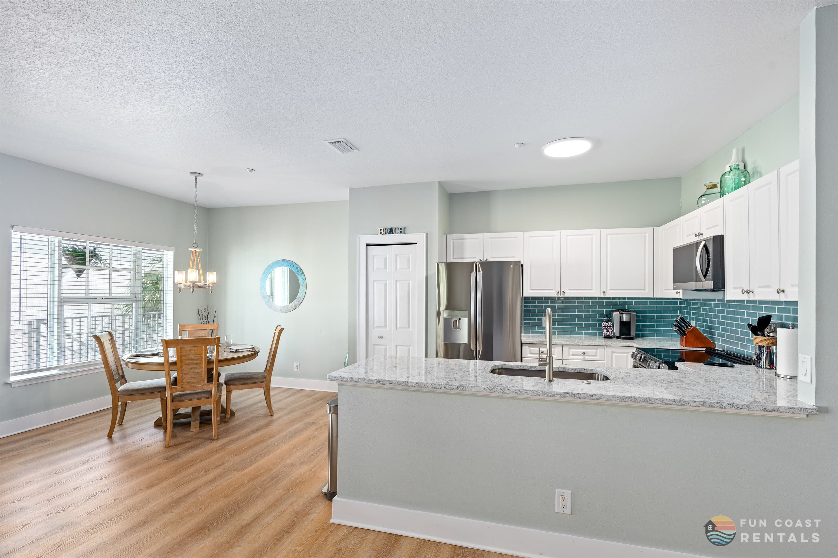 Gorgeous Stainless Steel Kitchen and Dining Area