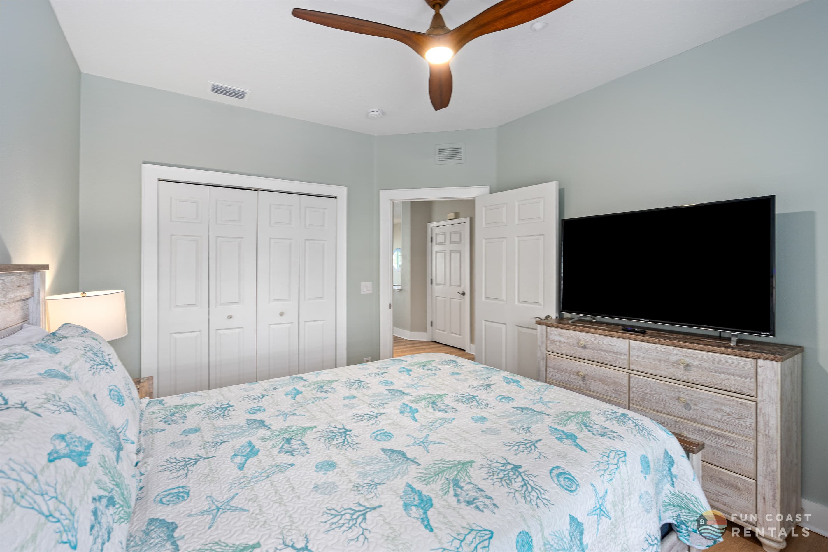 Queen Bedroom w/ 55" Smart TV and Private Balcony Overlooking Flagler Ave!