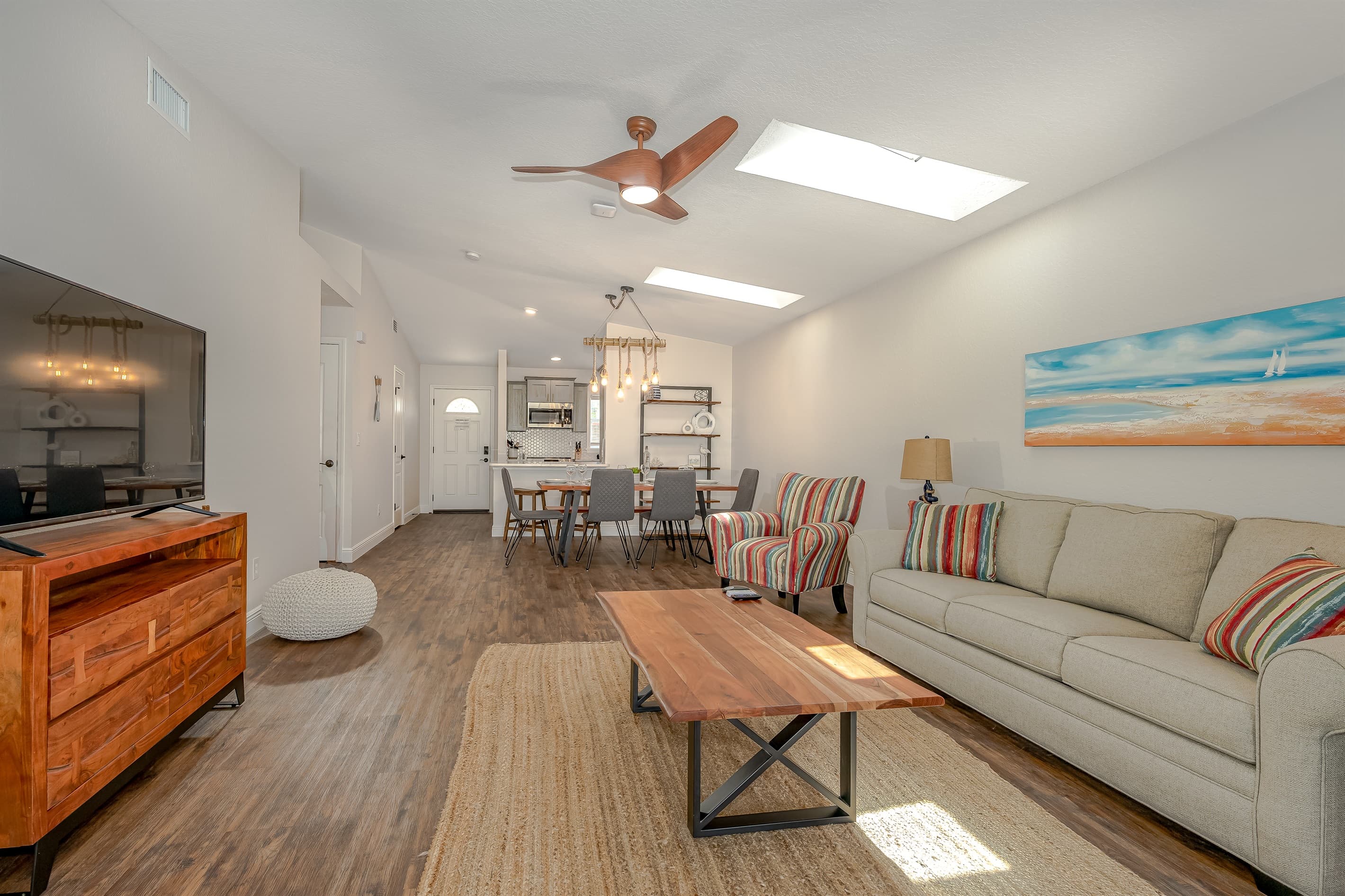 Island Time Living Room w/ 55" HD Smart TV and Dining Table